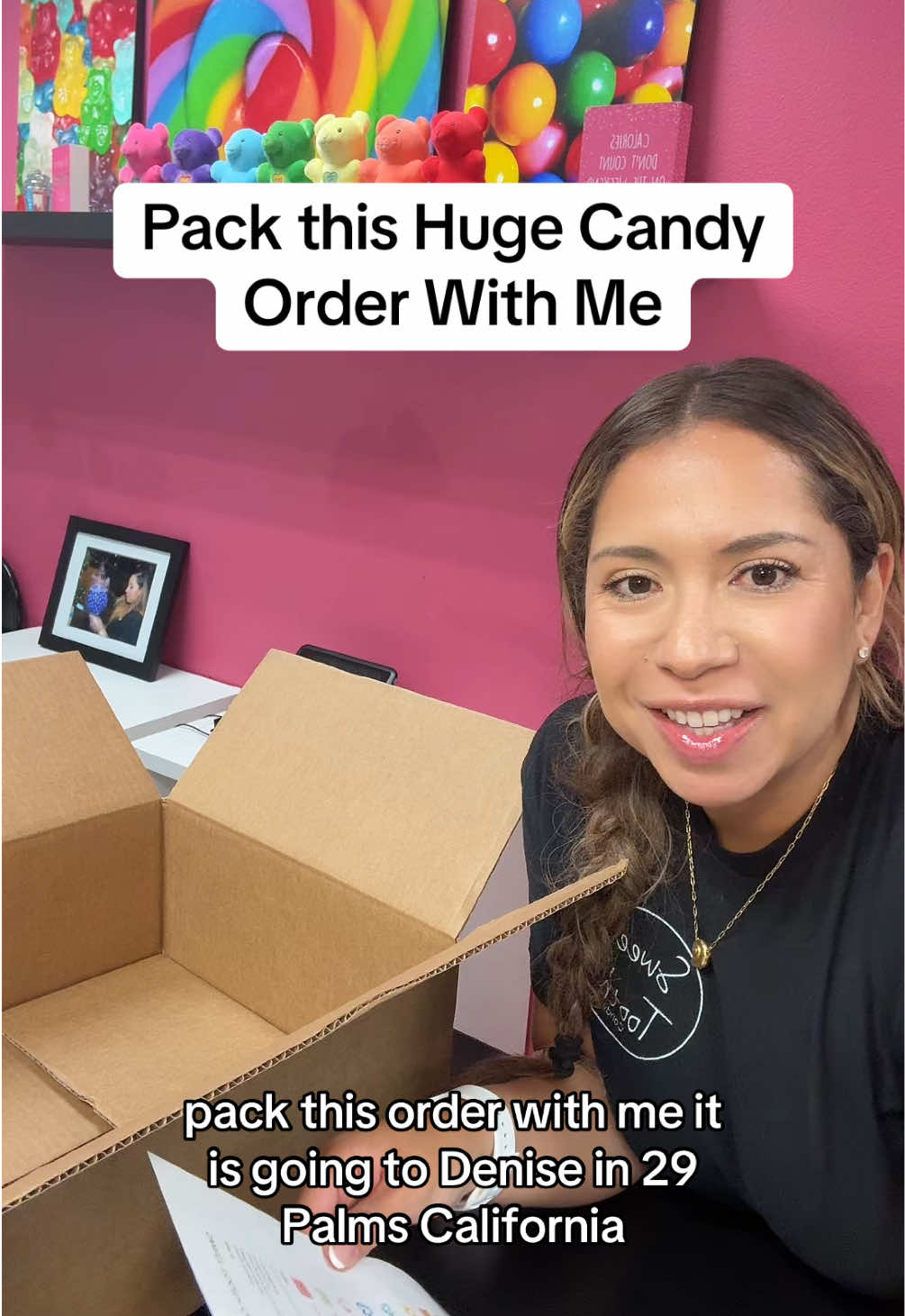 Ursula packing a candy order at Sweet Mood